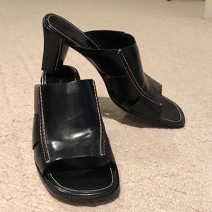 Black Cole Haan leather slides
